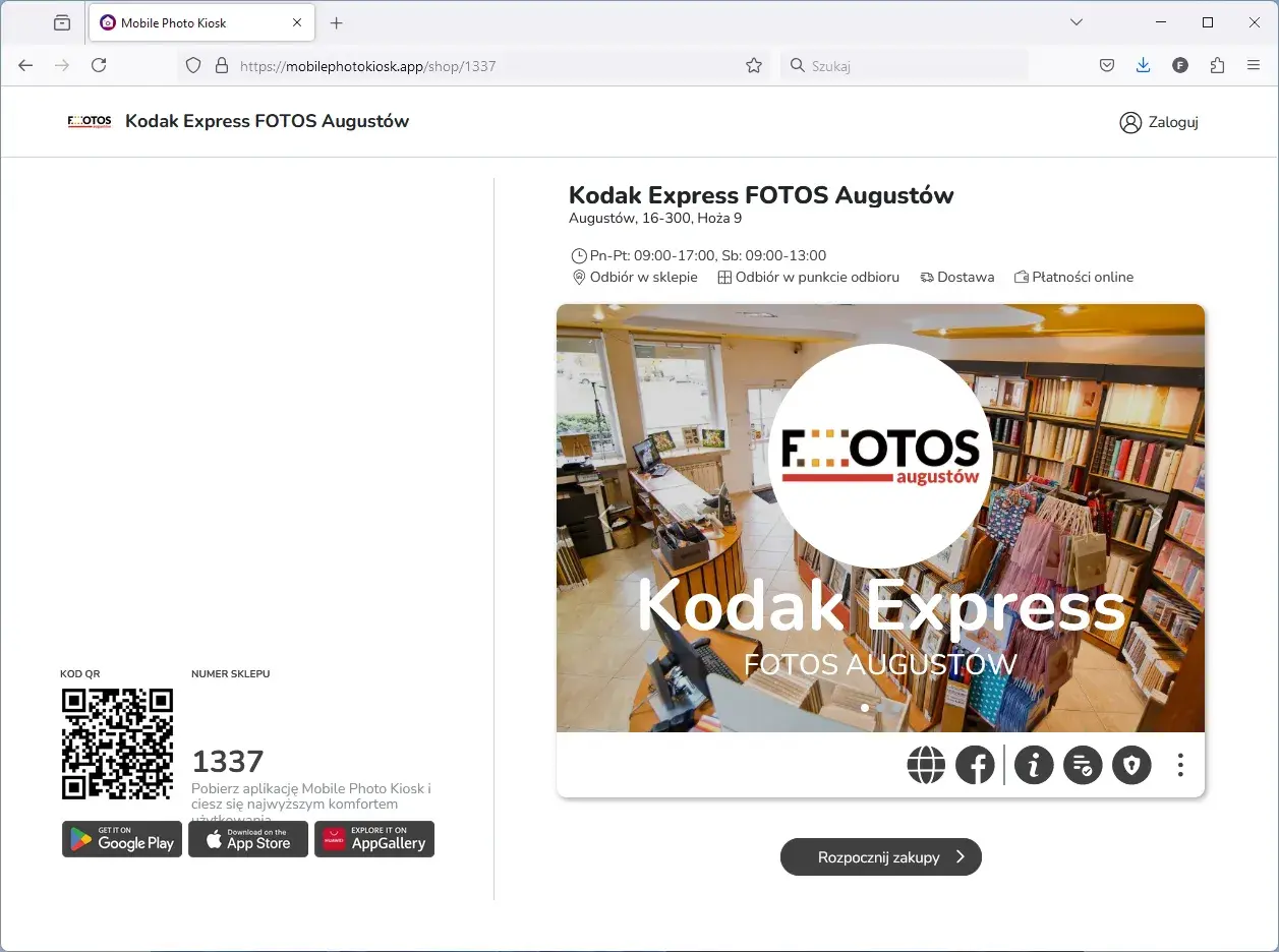 Wnętrze sklepu Kodak Express FOTOS Augustów z półkami pełnymi albumów i akcesoriów fotograficznych.