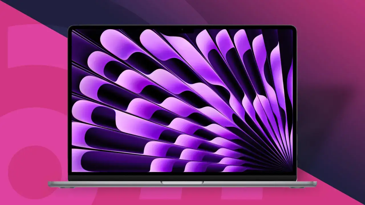 Elegancki laptop z fioletową tapetą. Idealny, jeśli zastanawiasz się, jaki laptop do Photoshop-a wybrać.